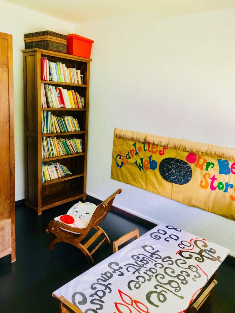 Children can take their pick of books from the shelves inside the library. (Credit: Tambalog)