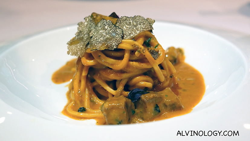 Spaghetti alla chitarra con ragout di Costine e Tartufo Homemade square spaghetti pasta “Chitarra” served with braised beef short ribs ragout Black truffle shavings