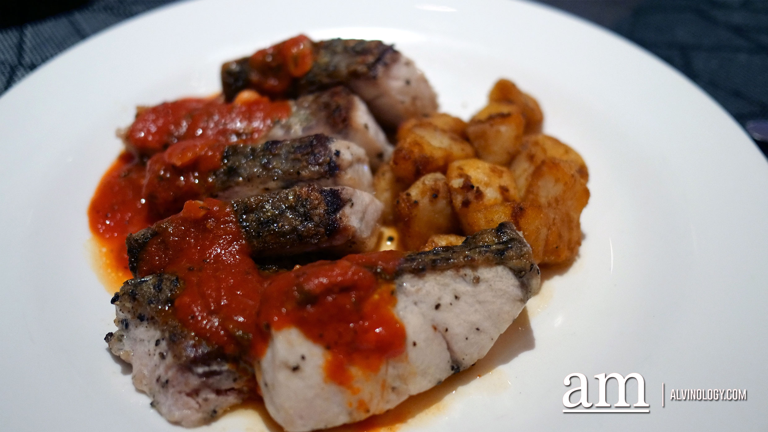 Sea bass with potato wedges 