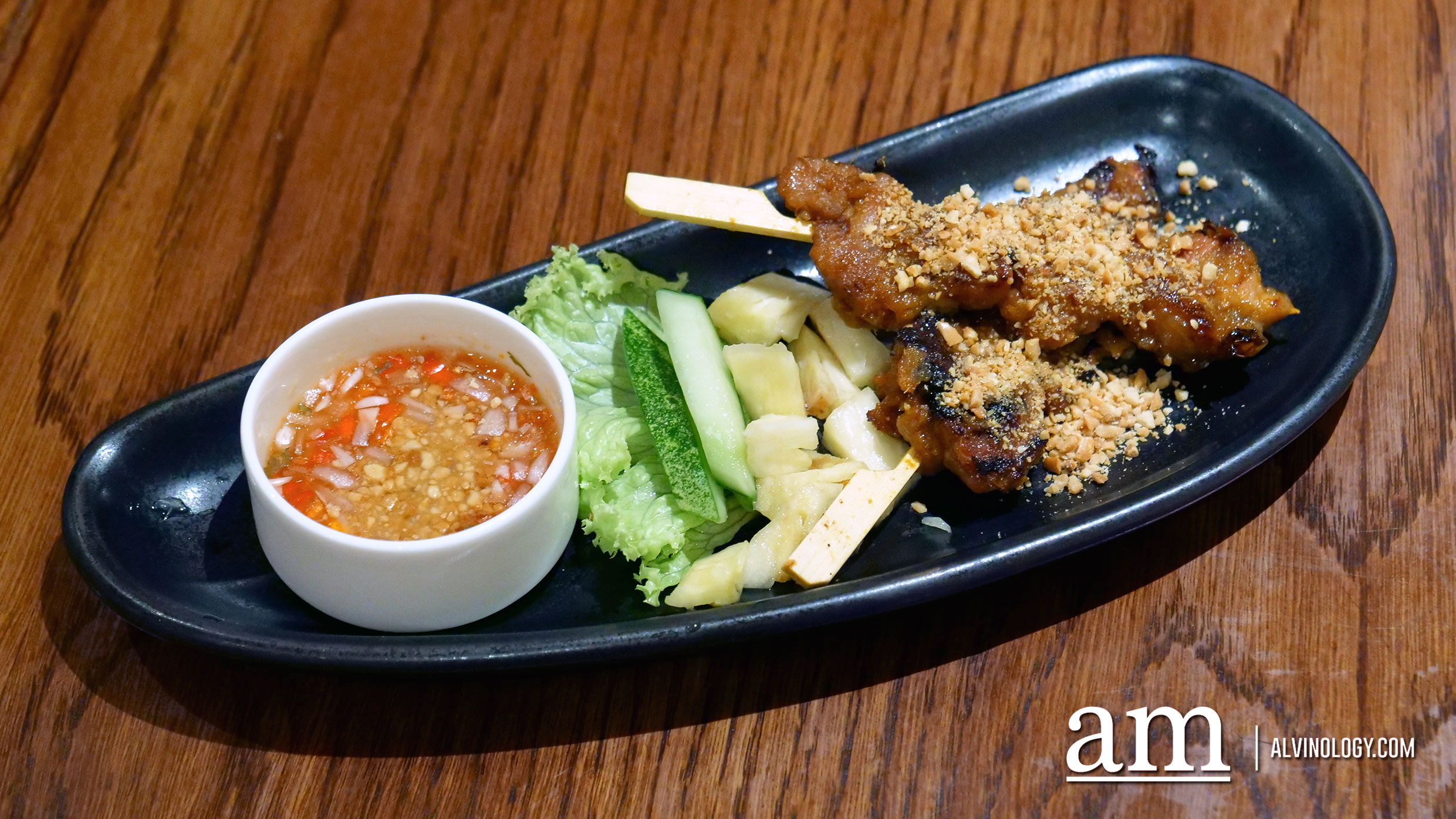 Enjoy a Peranakan Buffet Feast this Christmas at INDOCAFE - The White House Babi Panggang (nyonya-style pork skewer served with lime chili sauce)