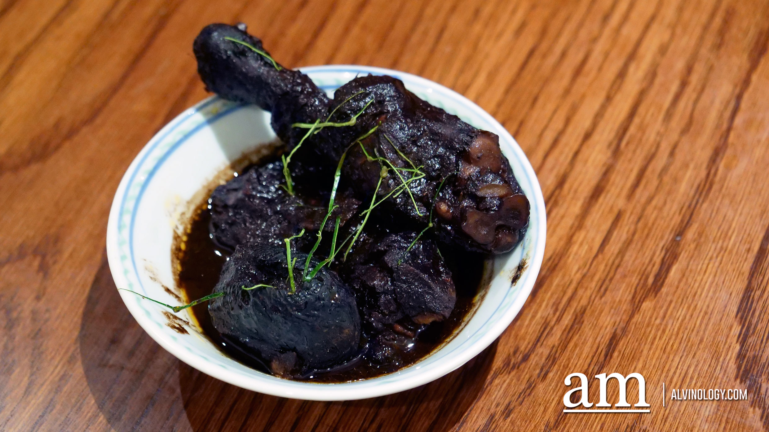 Enjoy a Peranakan Buffet Feast this Christmas at INDOCAFE - The White House Ayam Buah Keluak (organic chicken braised in black nut paste and exotic spices)