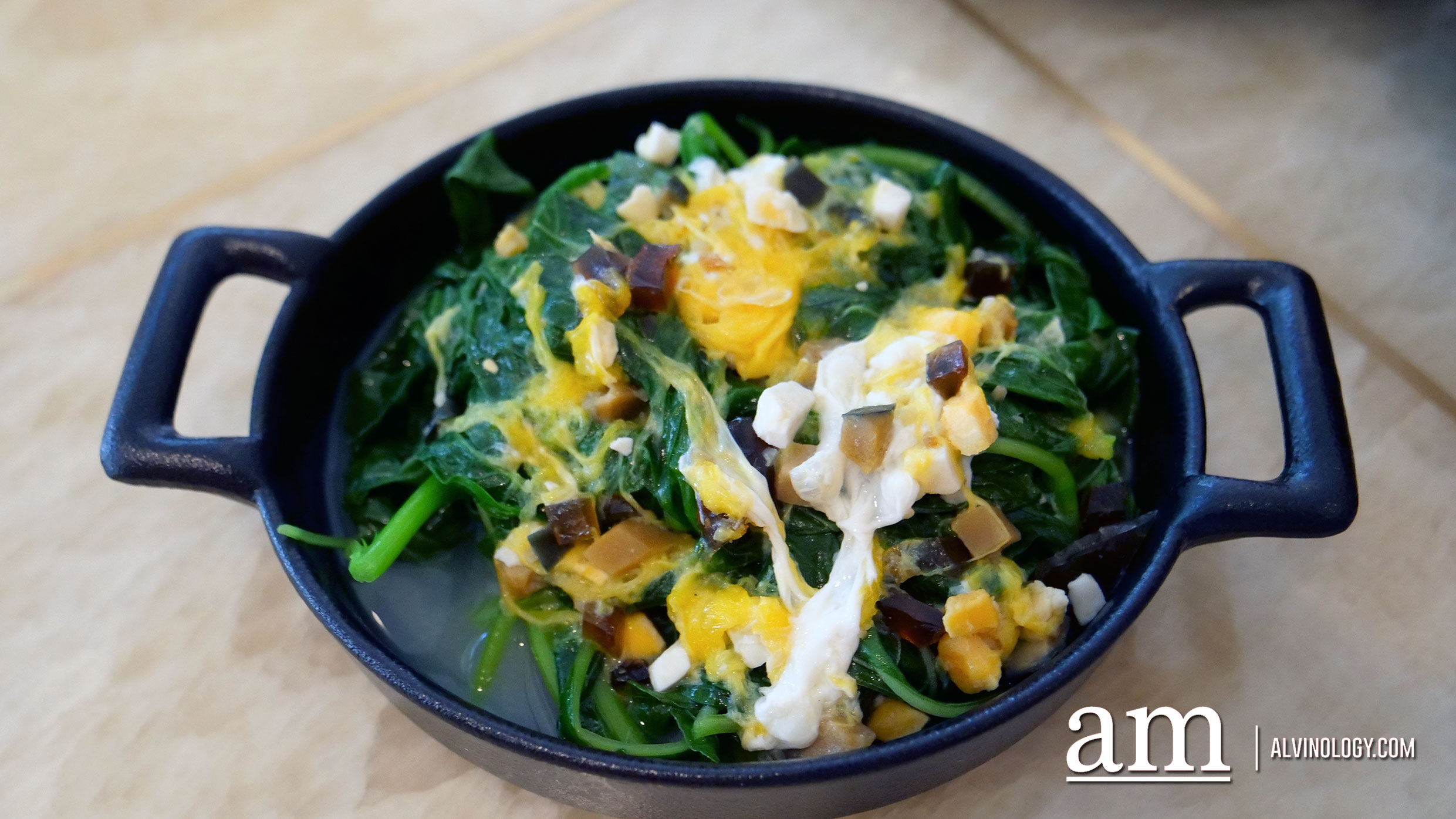 Poached Chinese spinach with trio egg in superior broth 