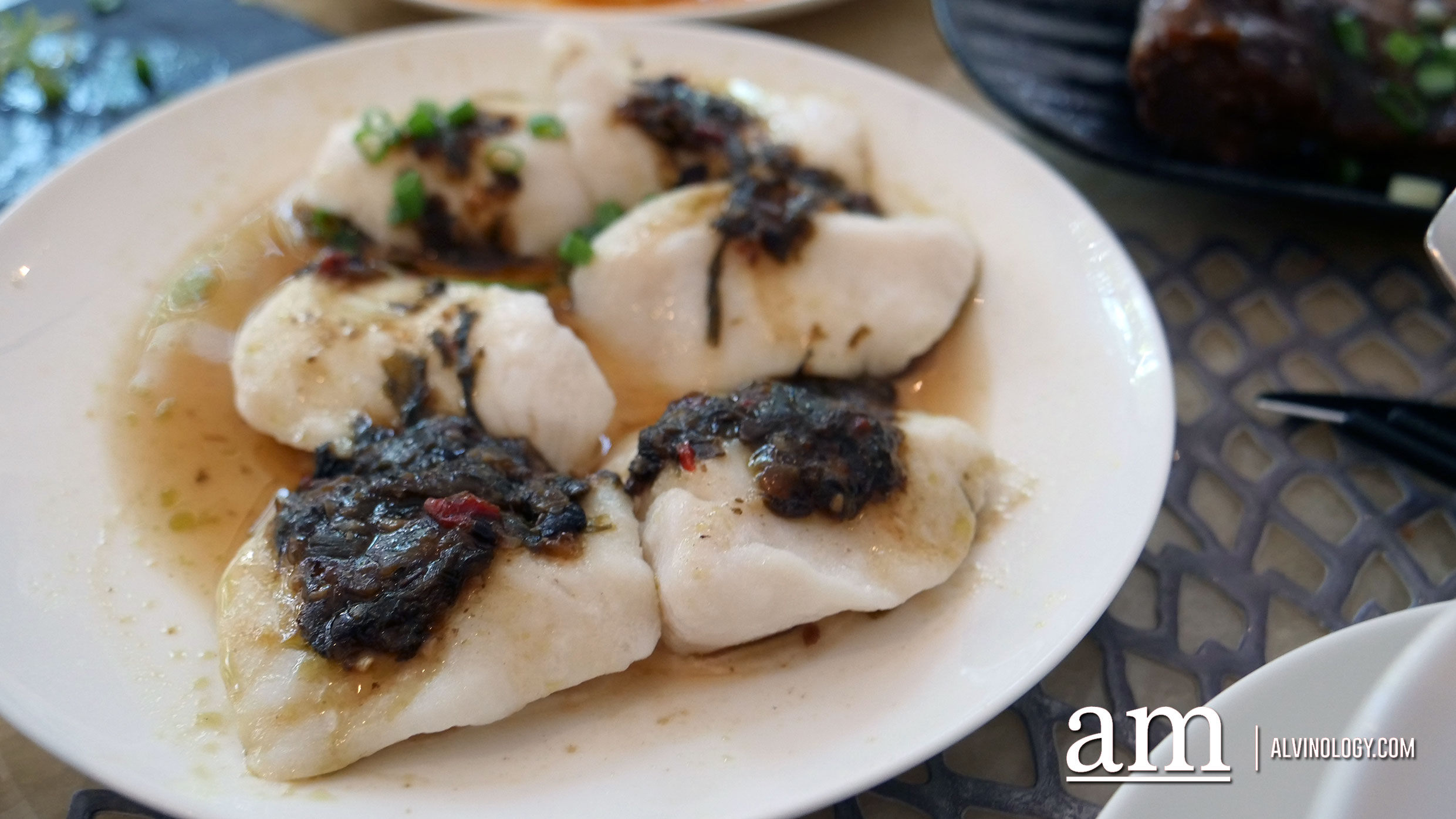 Steamed firsh with olive vegetable in black bean sauce