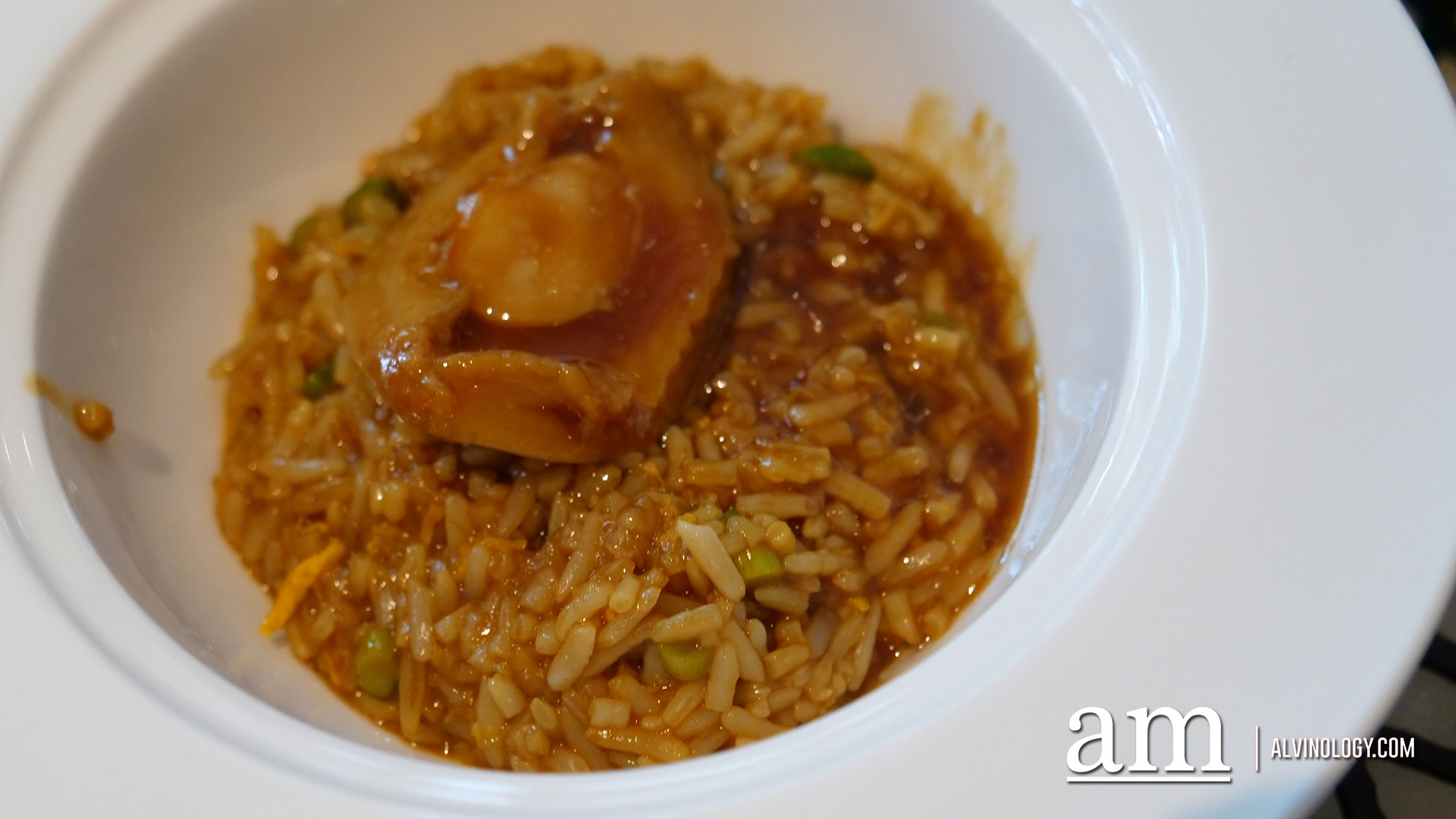 Braised abalone and superior broth rice with truffle oil 