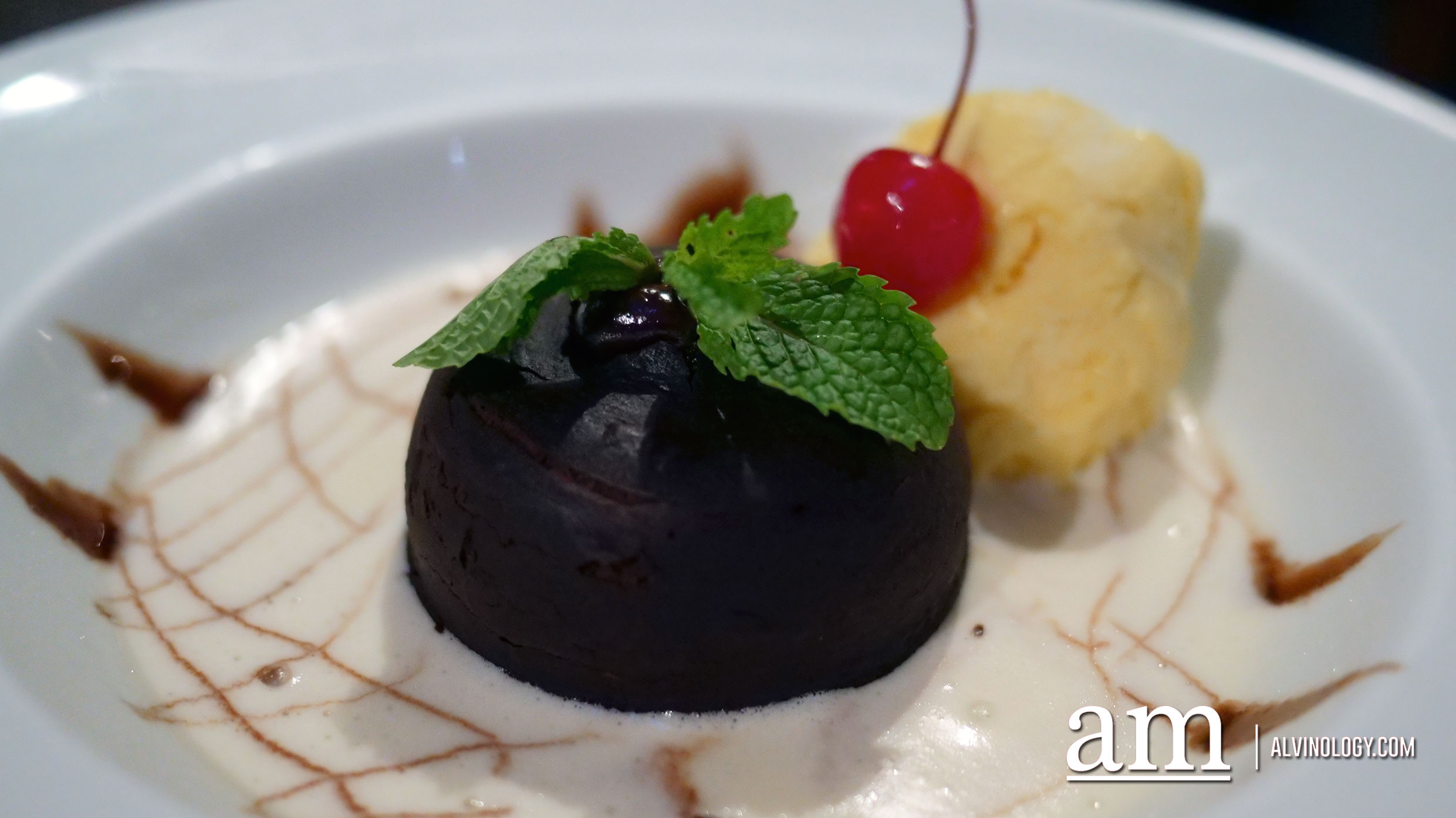 Chocolate lava cake, vanilla cream, mango ice cream