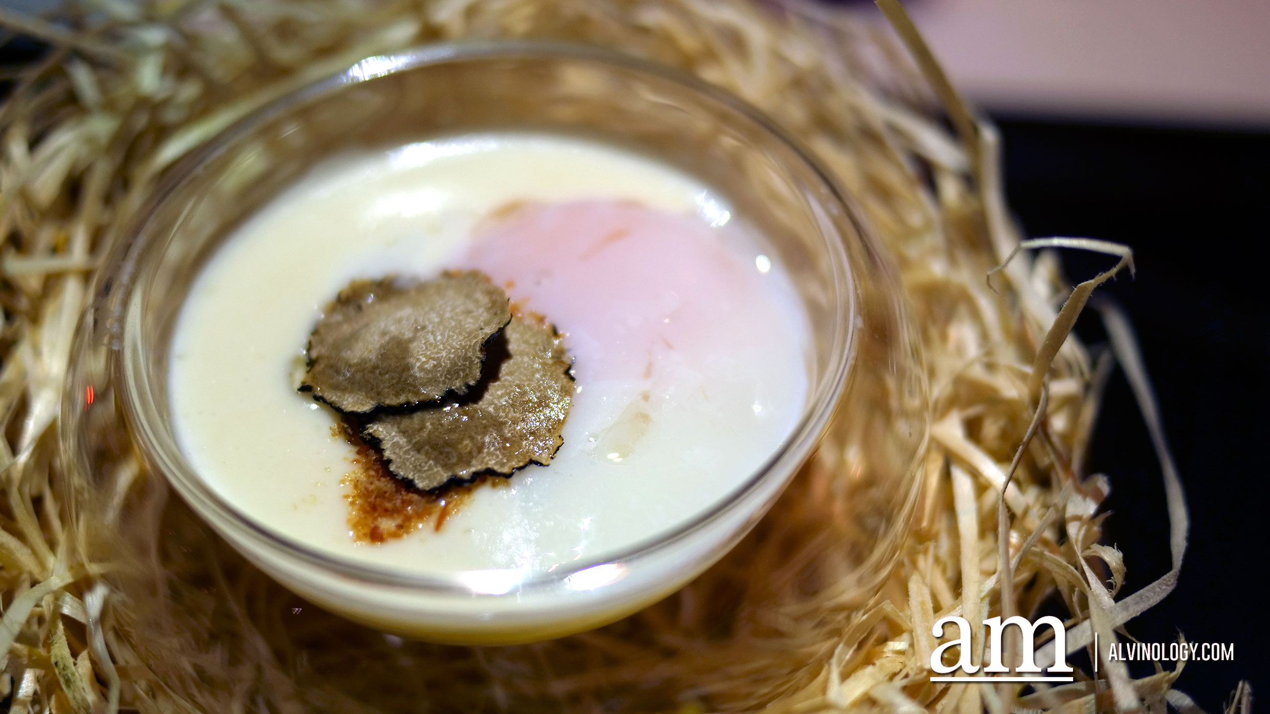 45 minutes slow cooked egg on a Parmesan cheese fondue, fresh black truffle and crispy pancetta powder