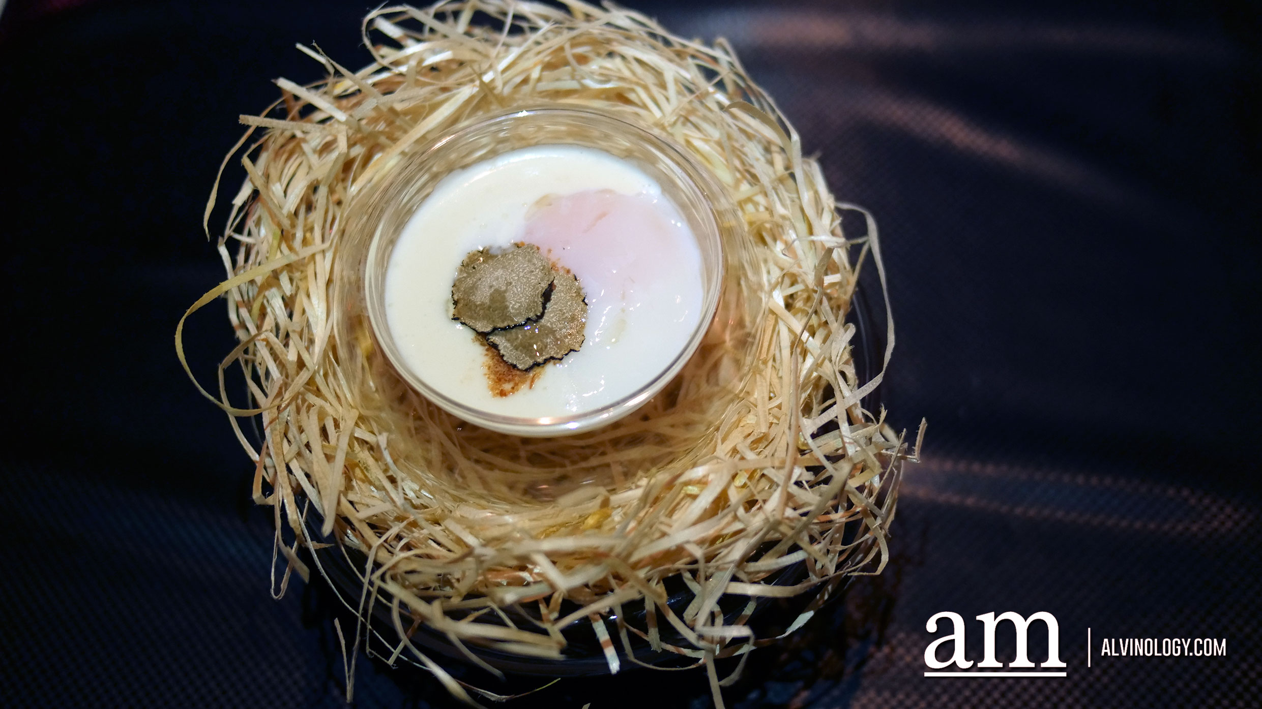 45 minutes slow cooked egg on a Parmesan cheese fondue, fresh black truffle and crispy pancetta powder 