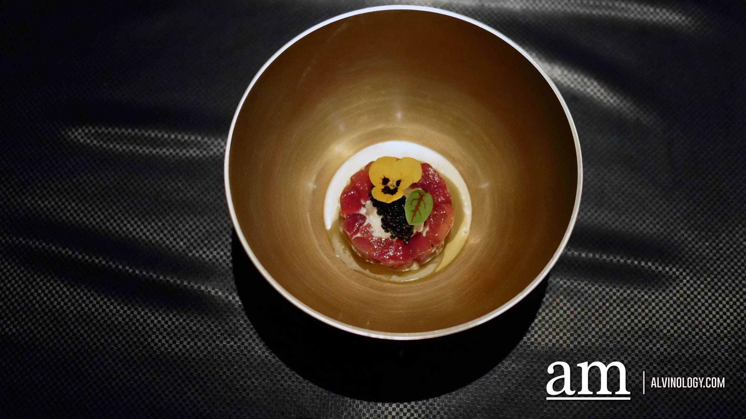 Yellow fin tuna tartar with burrata cheese and smoked caviar 
