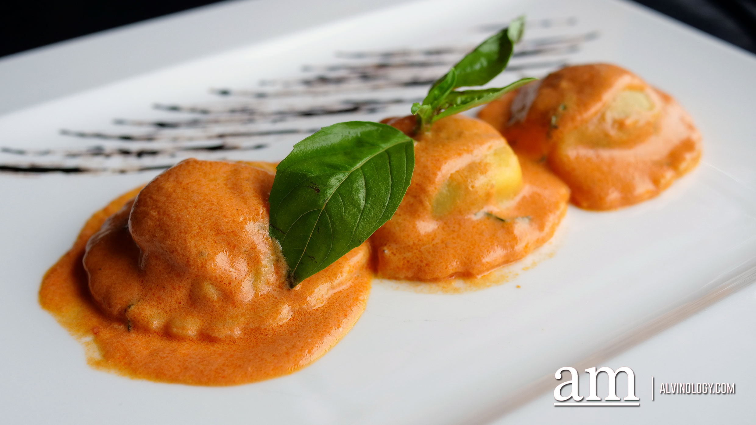 “Ravioli” Spinach & Ricotta Cheese with Cream and Tomato Sauce