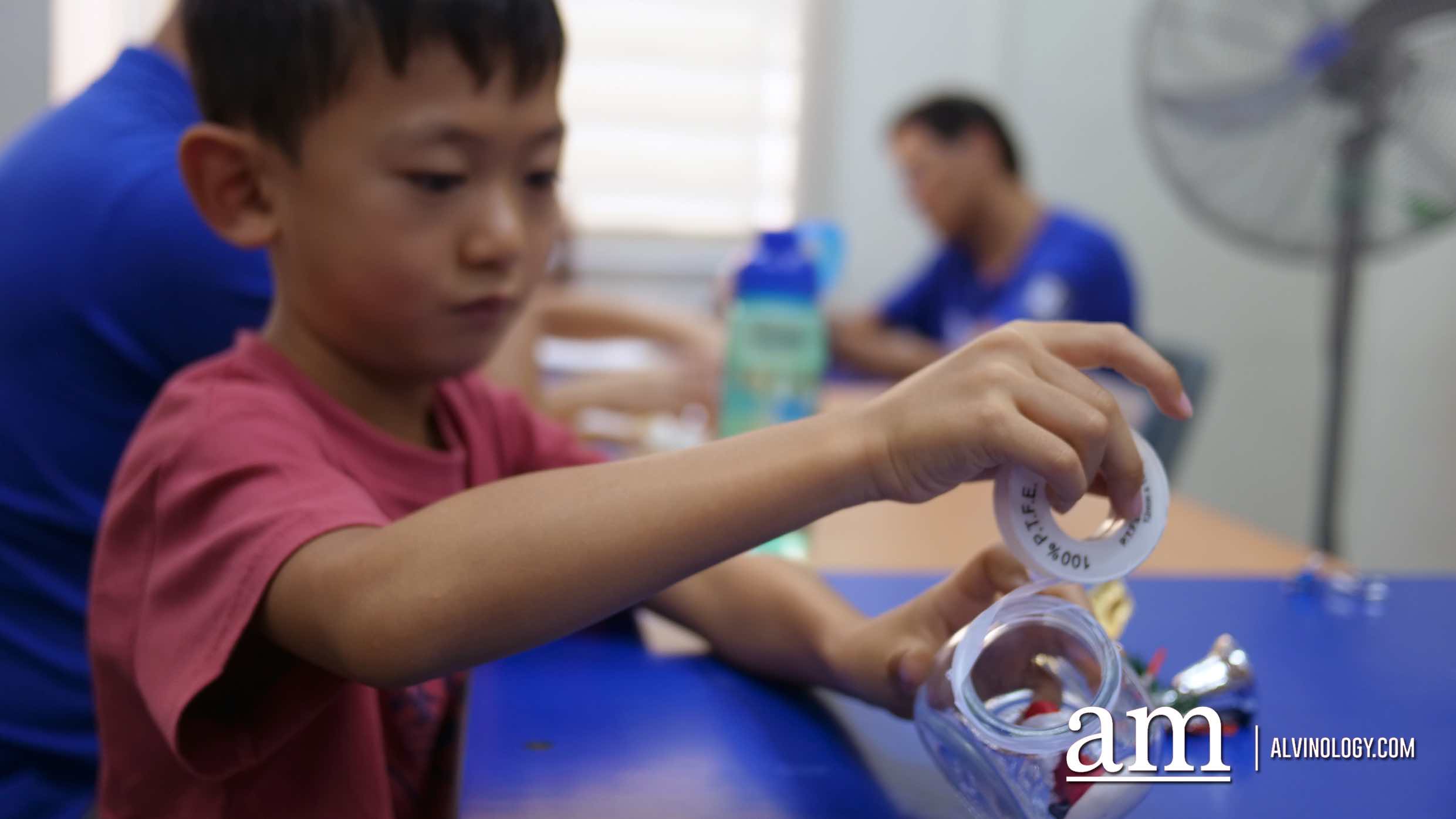 Learn how to make snow globes, bake cookies and more from just $40 per parent-child pair with the PA School Holidays Series Asher at work