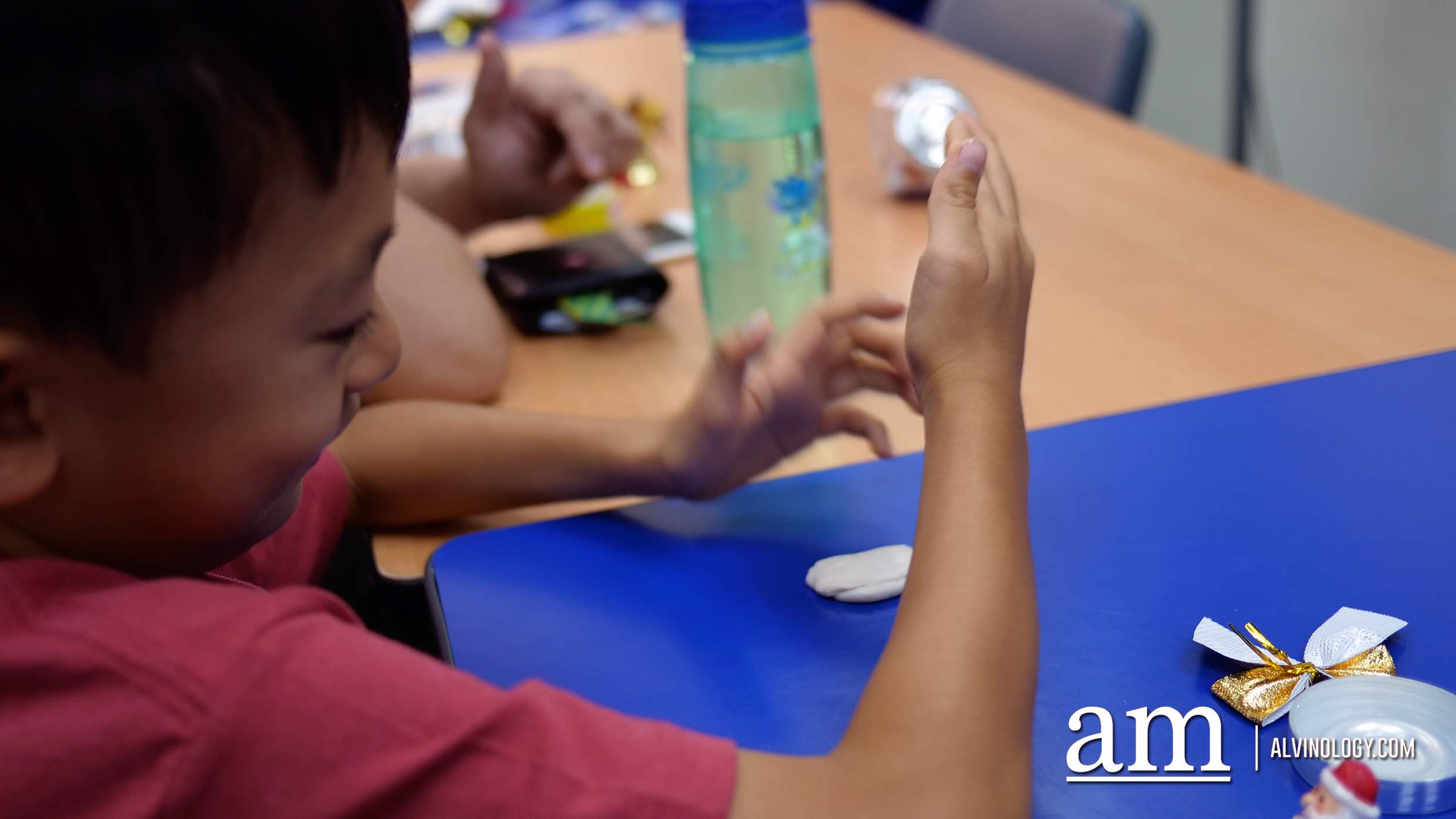 Learn how to make snow globes, bake cookies and more from just $40 per parent-child pair with the PA School Holidays Series Asher gets to work kneading the resin