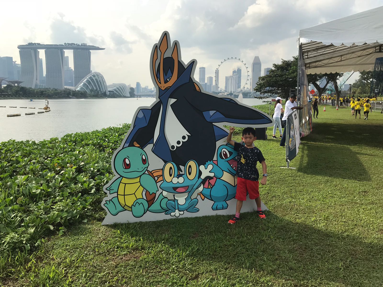 Asher posing with water Pokemons