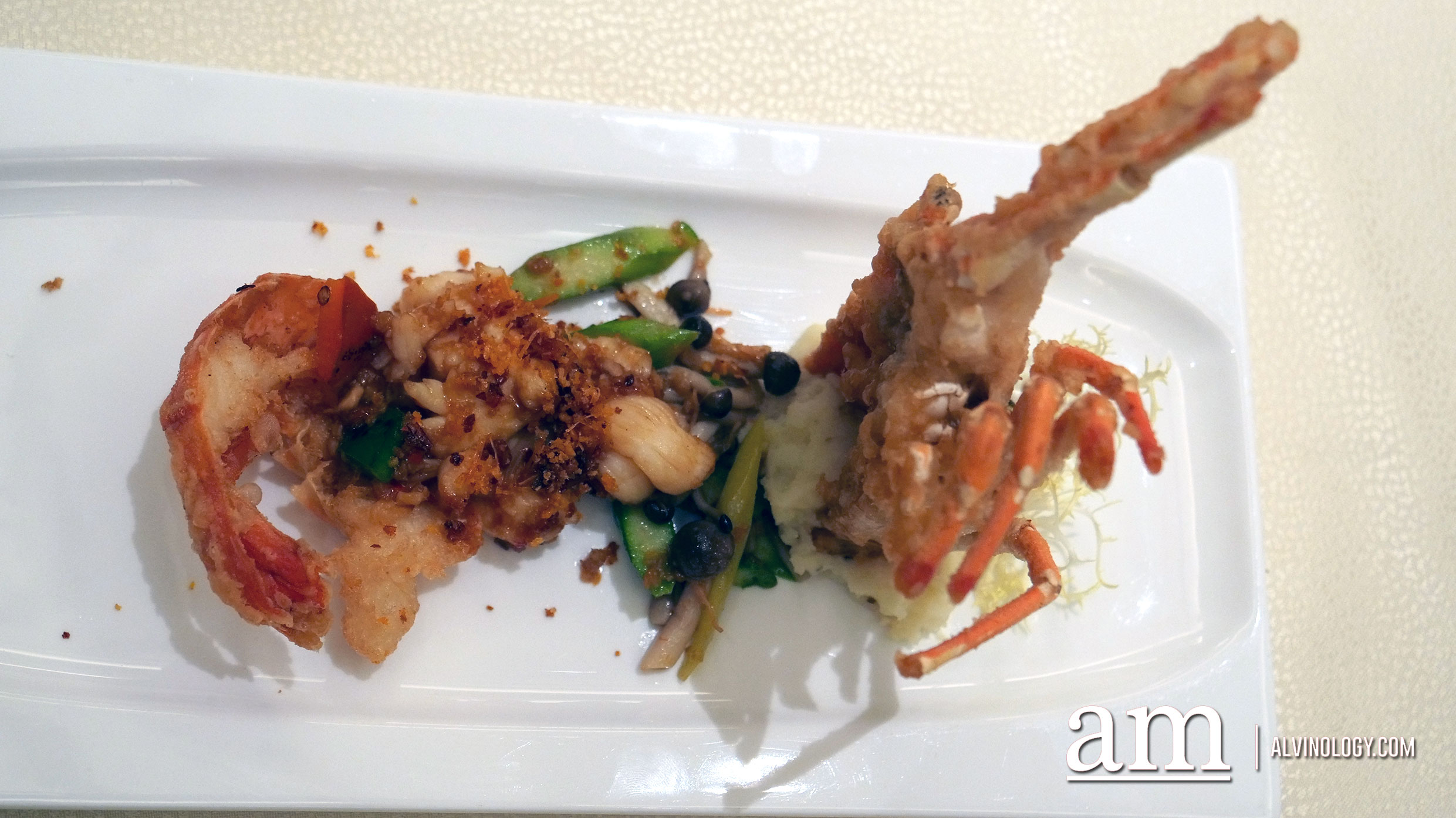Stir-fried Half Lobster topped with Crispy X.O. Chilli Sauce