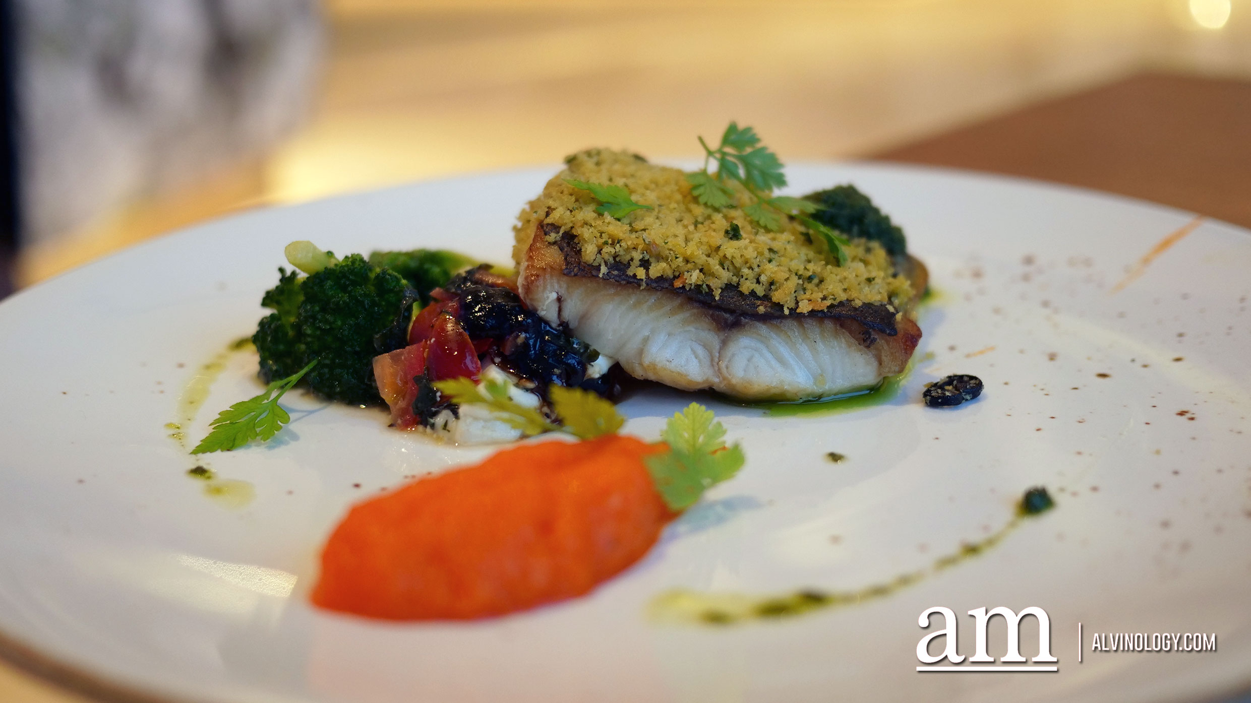Alaskan Black Cod (RM105) - Semi-dried tomatoes and olives crusted cod fish, carrot puree, caprese salad, cilantro-green chili sauce and basil oil 