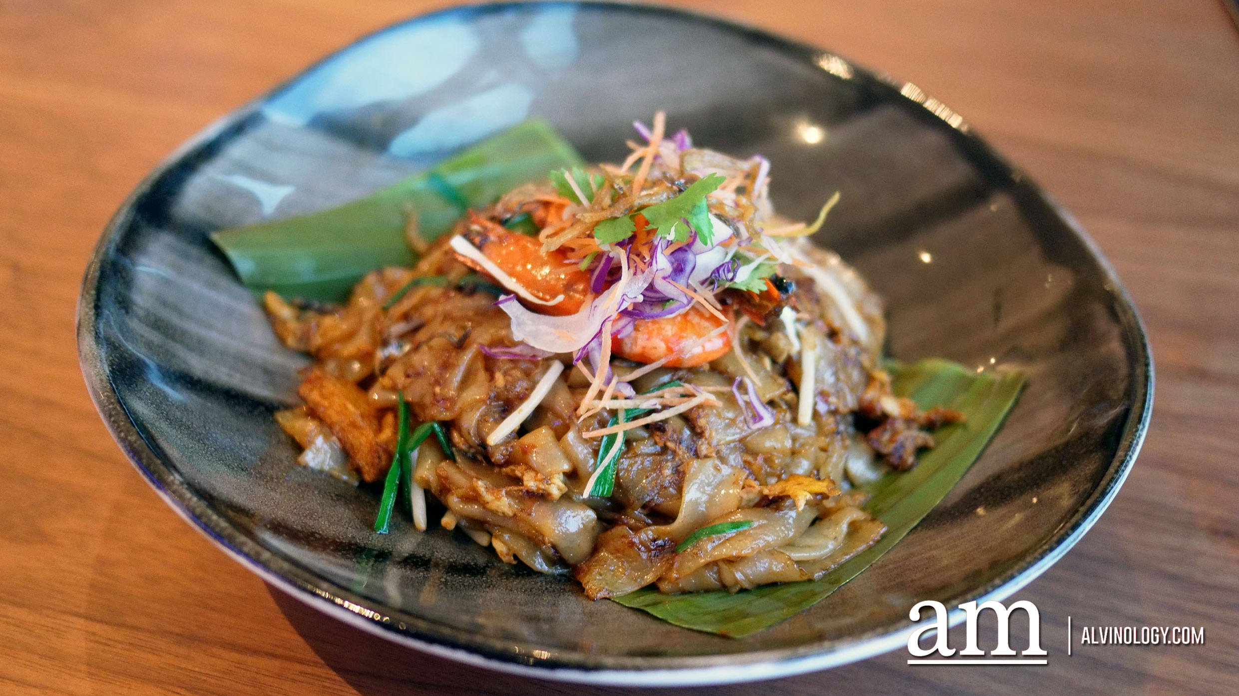 Seafood Char Kuay Teow (RM38) - Wok-fried rice noodles, egg, local chives, sprouts and fish cake. Topped with sauteed scallop, flower squid and prawn.