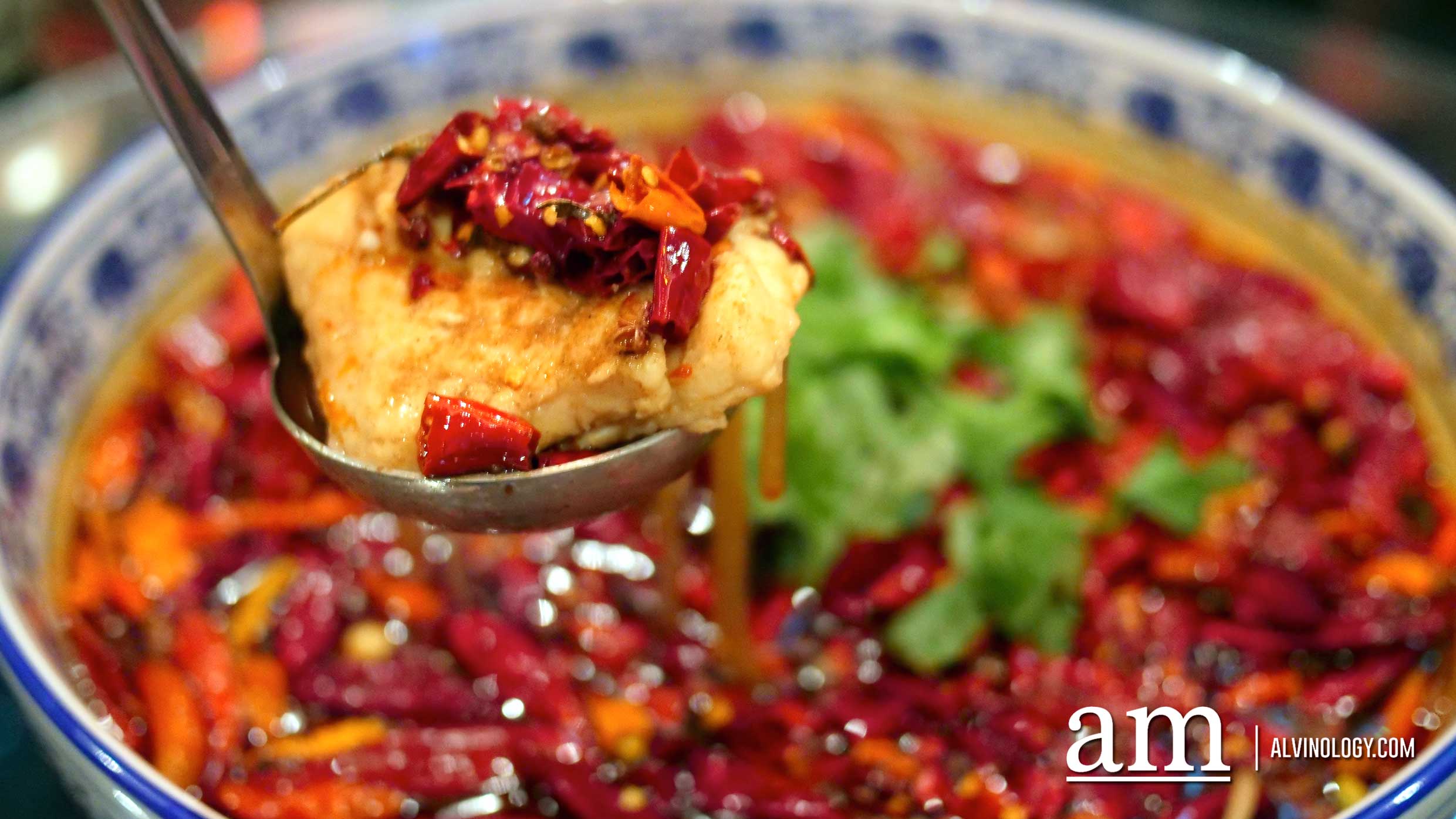Braised Garoupa Fish Fillet in Chili Oil Soup (S$40 for small and S$50 for large) - the soup is brim full of dried chili peppers, garlic, basil and braised grouper fish fillet.