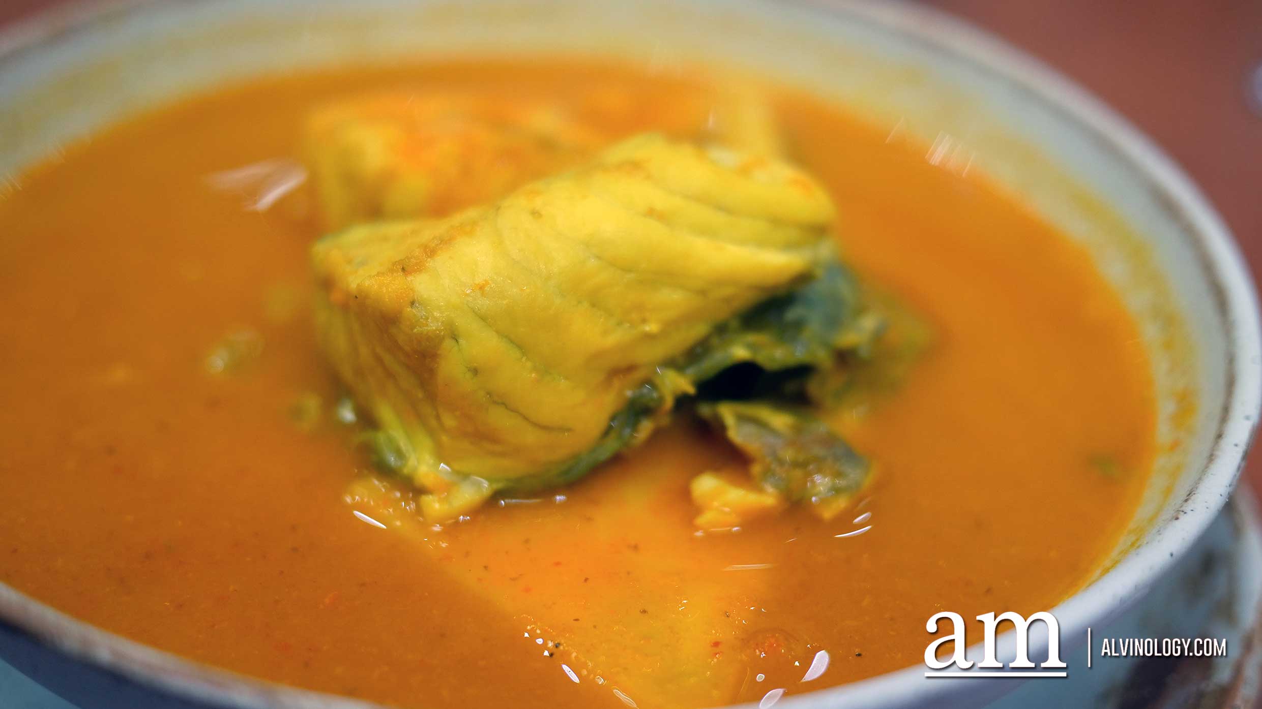 Gaeng Leung Yod Maprao Pla Grapong (Southern Thai style hot and spicy yellow curry soup with young coconut soup and sea bass) - 180 baht