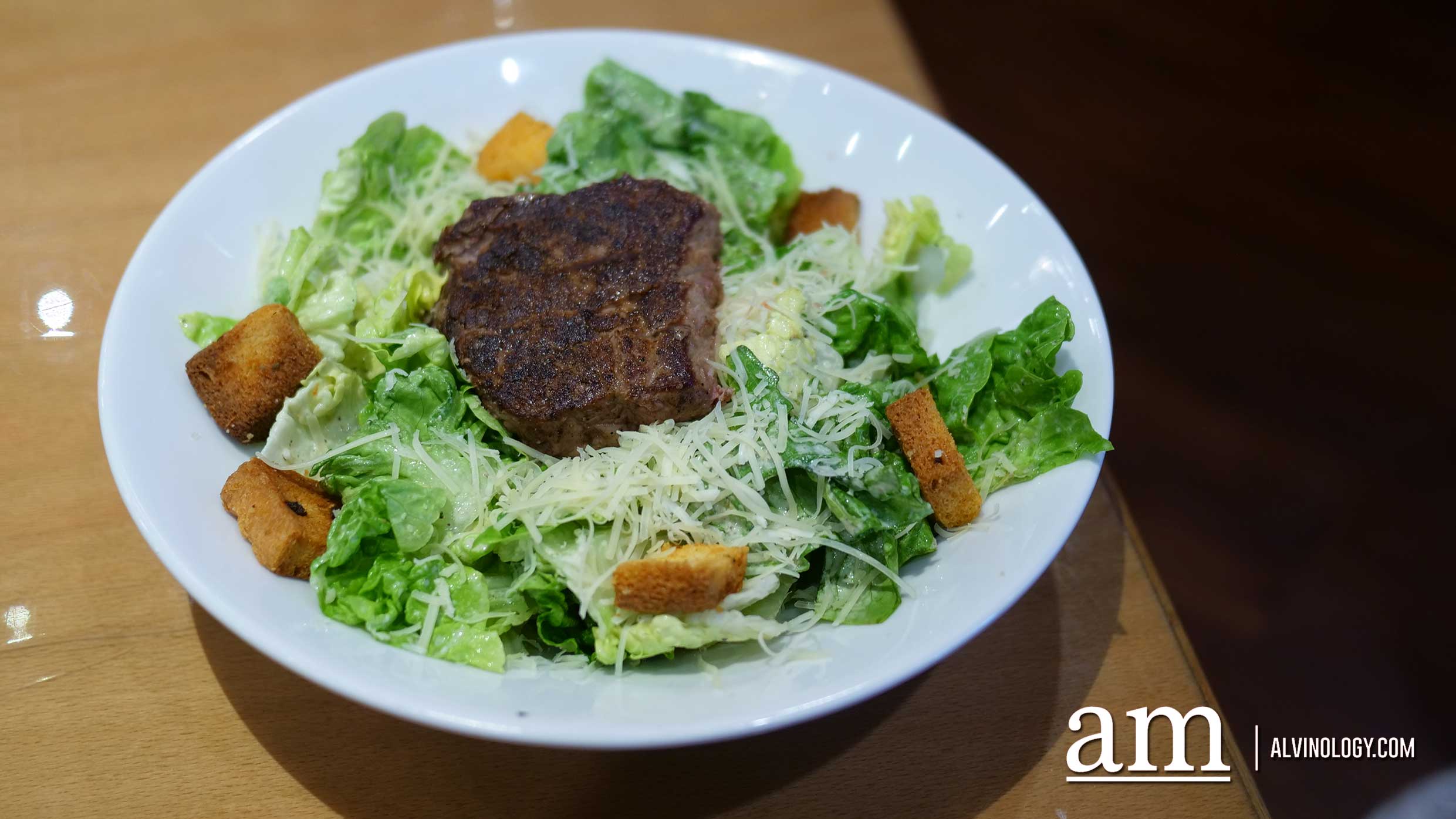 Steakhouse Salad (S$25.90) - Seared sirloin atop mixed greens, Aussie Crunch, tomatoes, red onions, cinnamon pecans and Blue cheese vinaigrette.