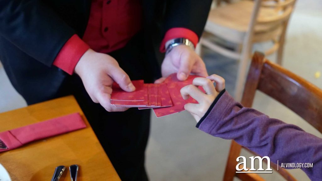 Tommillusions performing a magic trick with our deck of cards