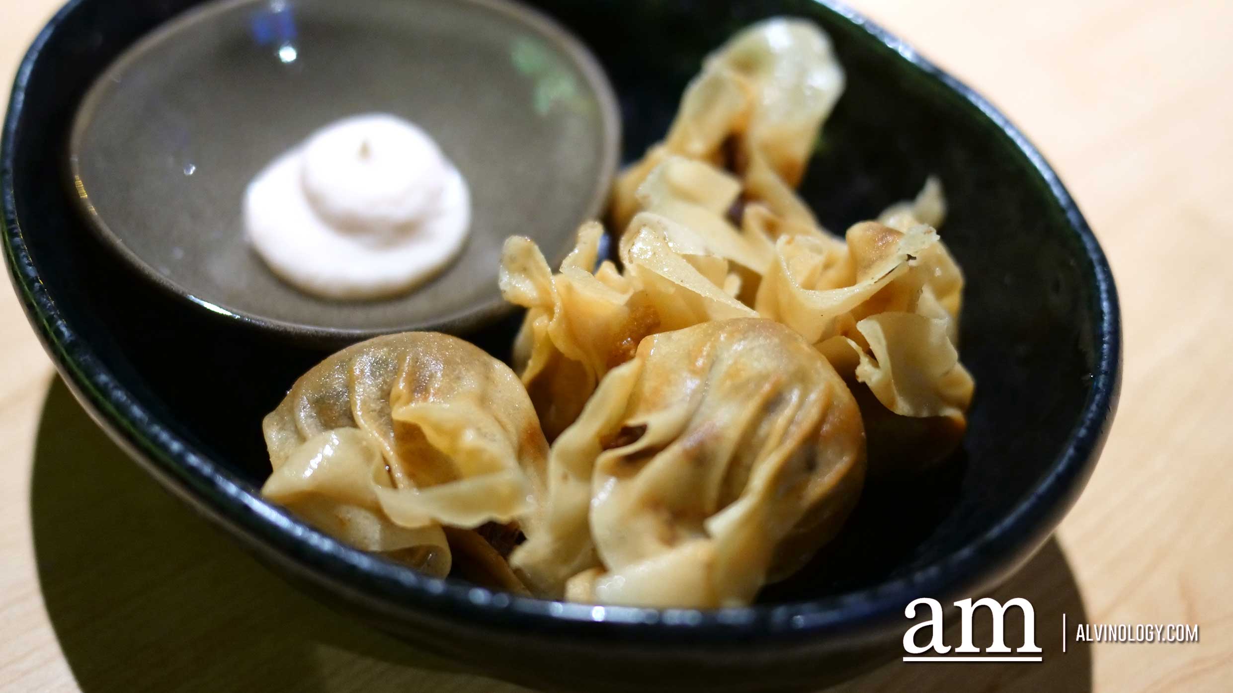 Rilette Dumplings ($7) - duck rillette, pickled onions, gherkins, mentaiko sauce