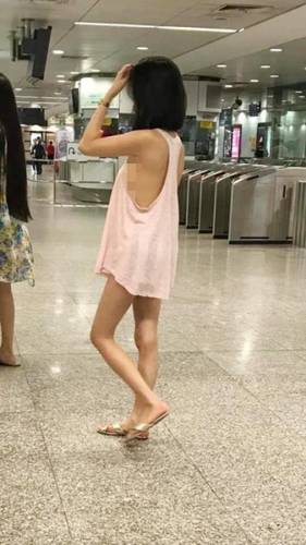 Filipino freelance model Ashley Garcia goes viral for queuing in Somerset MRT Station ATM in "scandalous outfit" - Alvinology