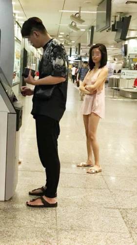 Filipino freelance model Ashley Garcia goes viral for queuing in Somerset MRT Station ATM in "scandalous outfit" - Alvinology