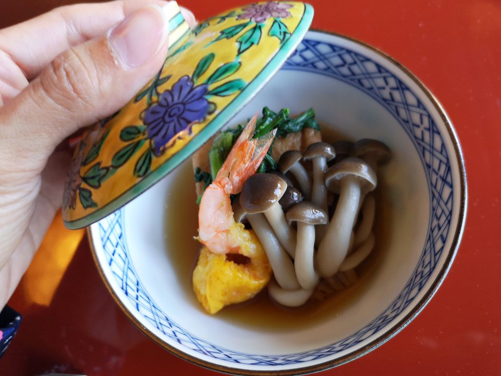 More tofu simmered with shimeji mushrooms.