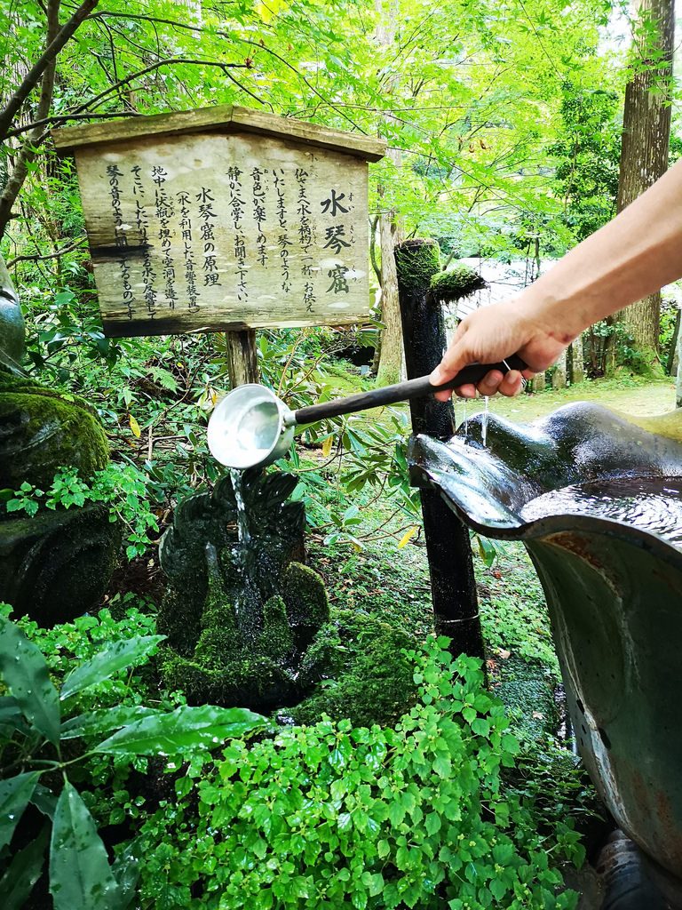 Bathe this Bodhisattva stone sculpture and listen intently for the tinkle of water as it runs through the pipes.