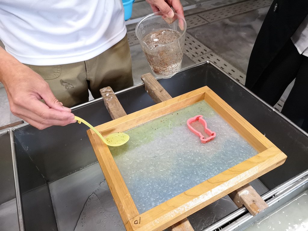 Making washi paper.