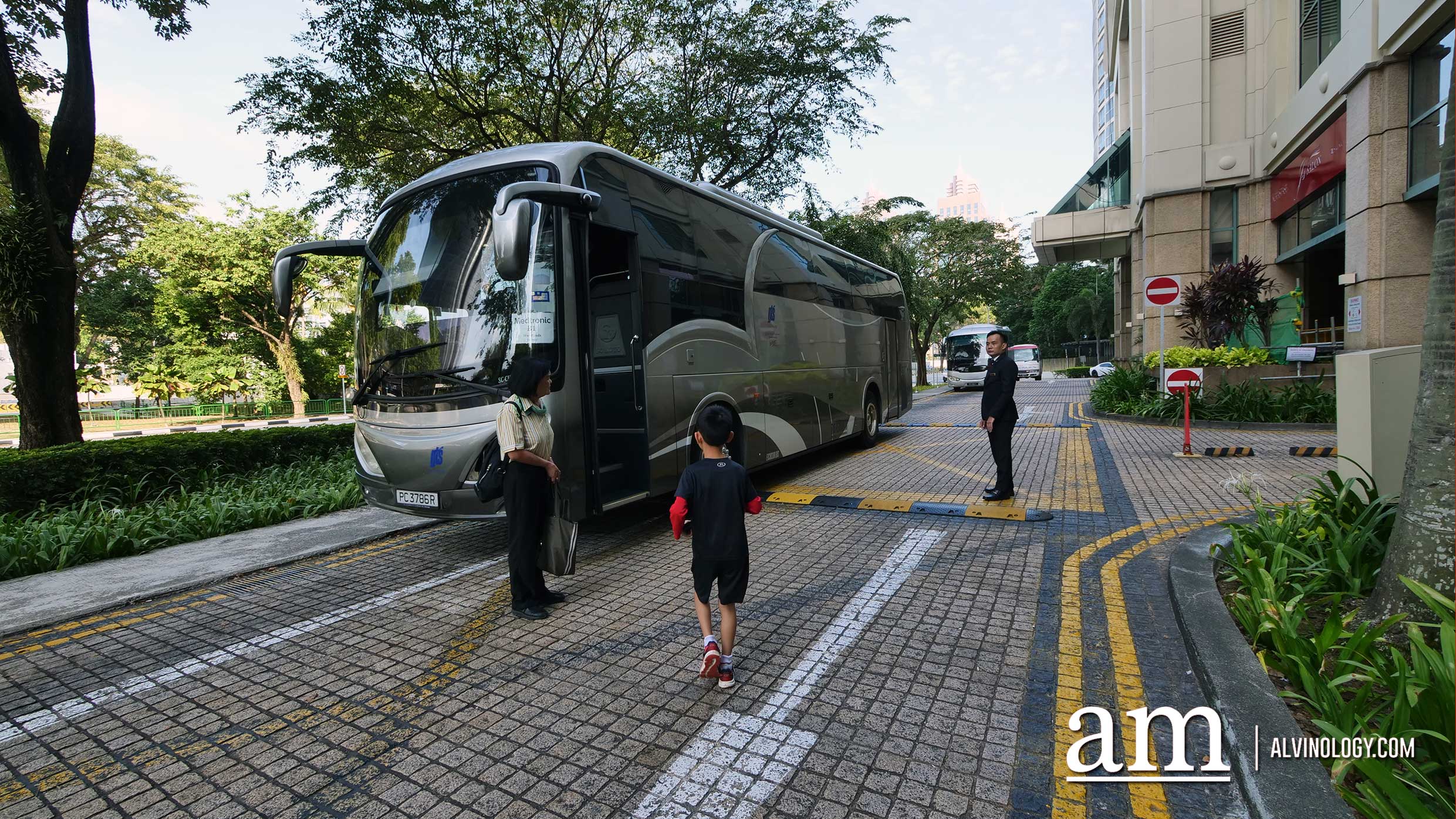 Asher getting on the tour bus