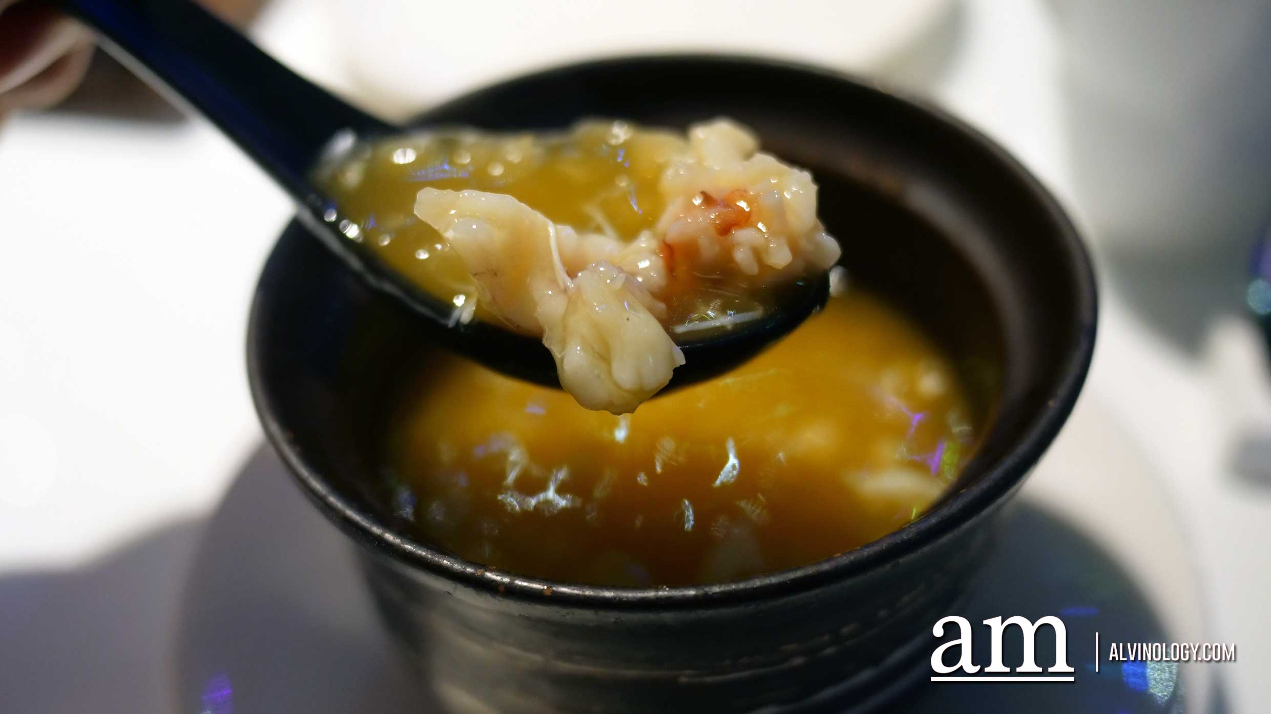Whole prawns served in the broth