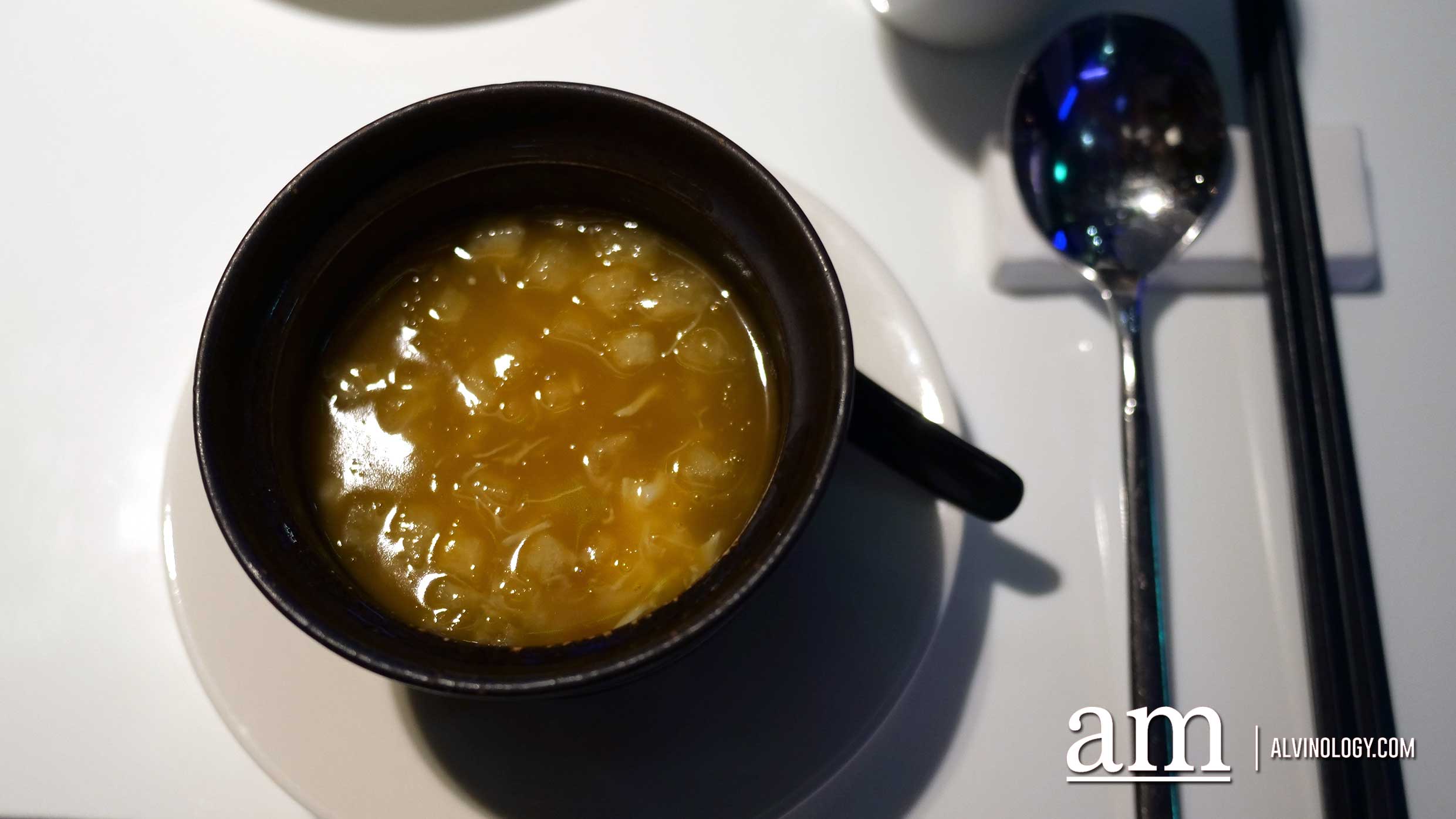 Signature Braised Fish Maw with Seafood in Carrot Broth