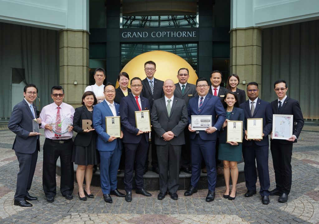 Grand Copthorne Waterfront Hotel Singapore General Manager and team with their numerous awards
