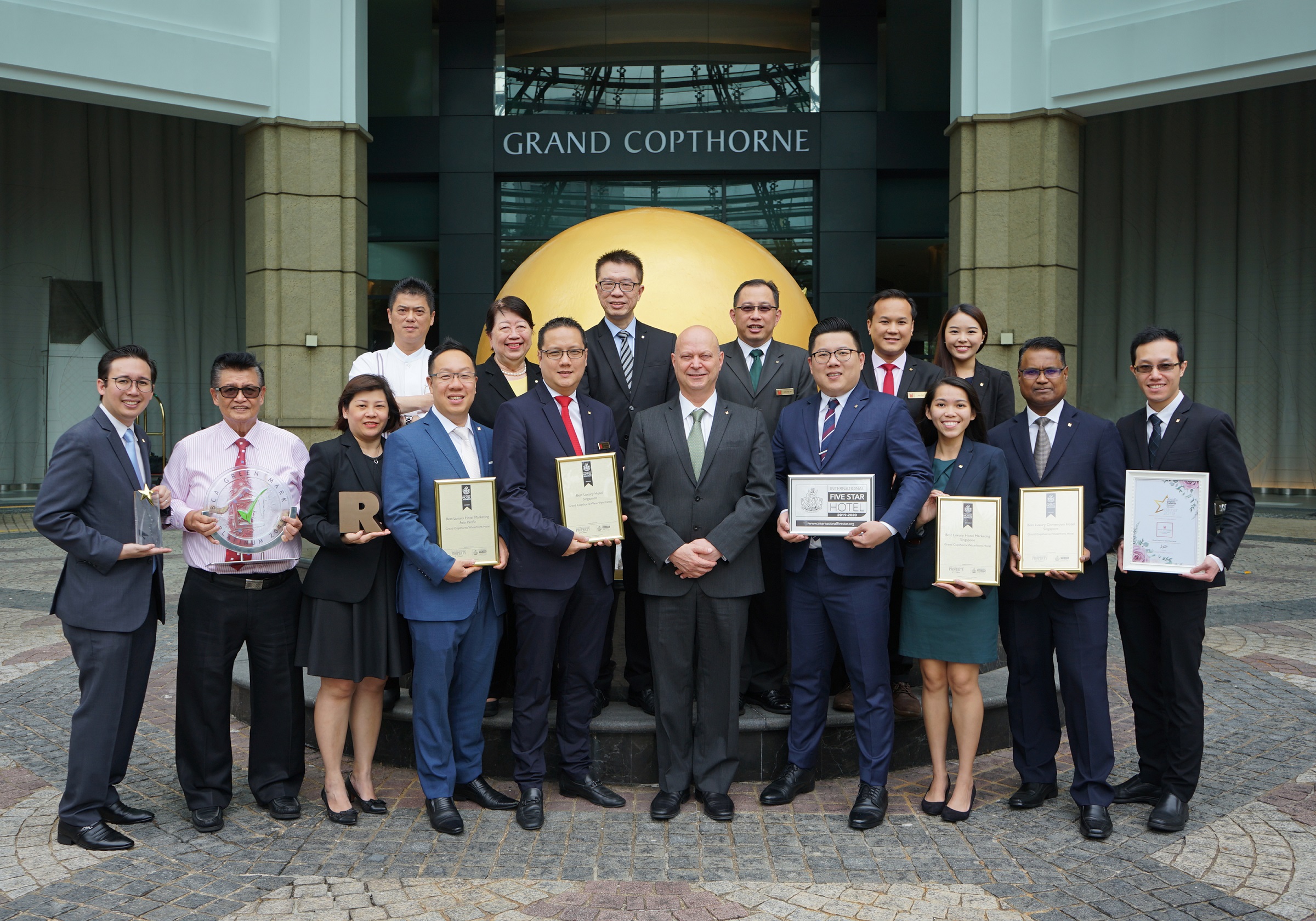 Grand Copthorne Waterfront Hotel Singapore General Manager and team with their numerous awards