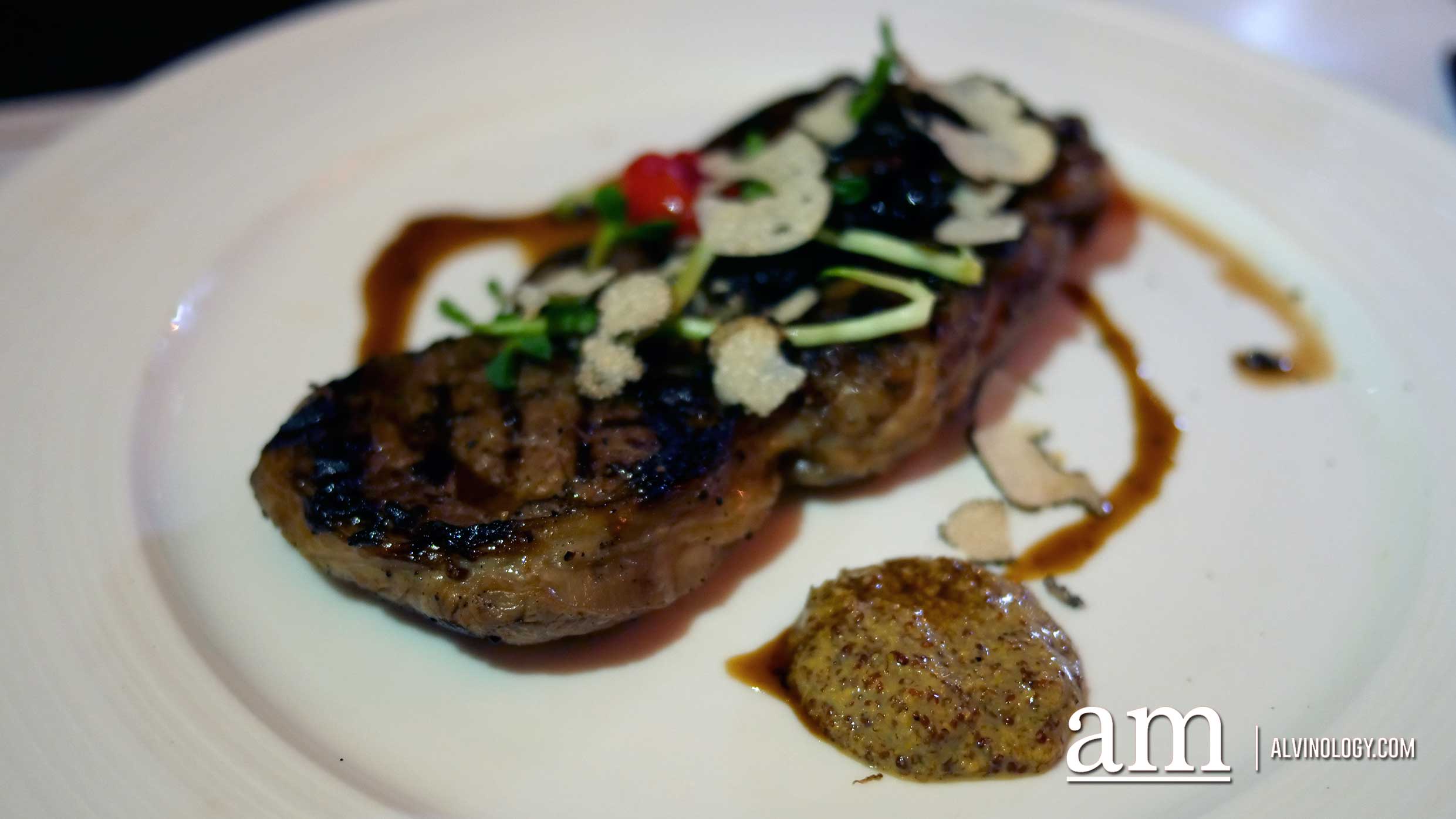 Char-grilled Ribeye steak with truffle fries and Pommery mustard