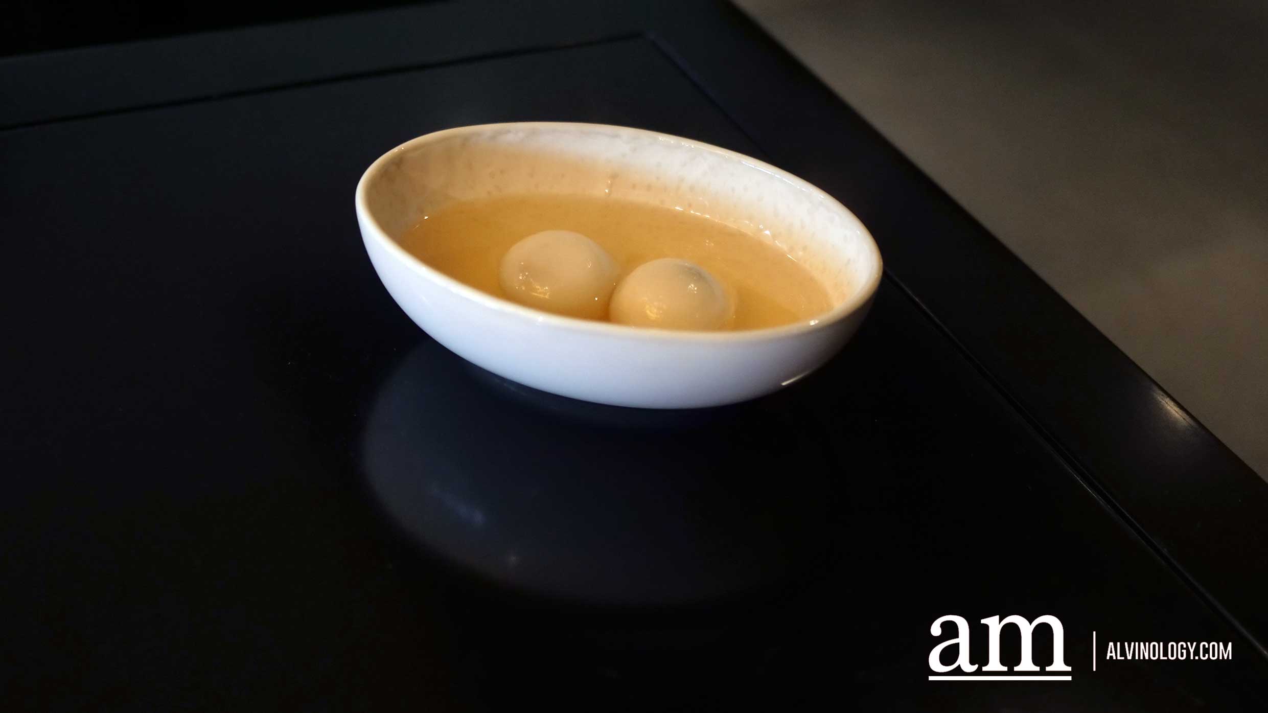 Tang Yuan in Ginger Tea - choice of black sesame or peanut ($8)