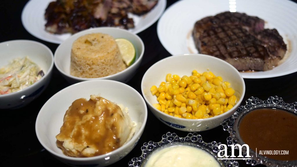 Accompanying sides - butter corn, coleslaw, mashed potatoes and rice