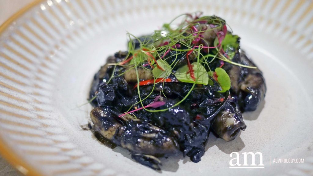 Sotong Masak Hitam, wok-fried squid with squid ink, shrimp paste and concentrated tamarind juices - $20