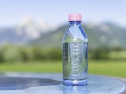 Evian natural mineral water bottles now have a pink bottle cap and 100% recyclable made from 100% recycled plastic - Alvinology