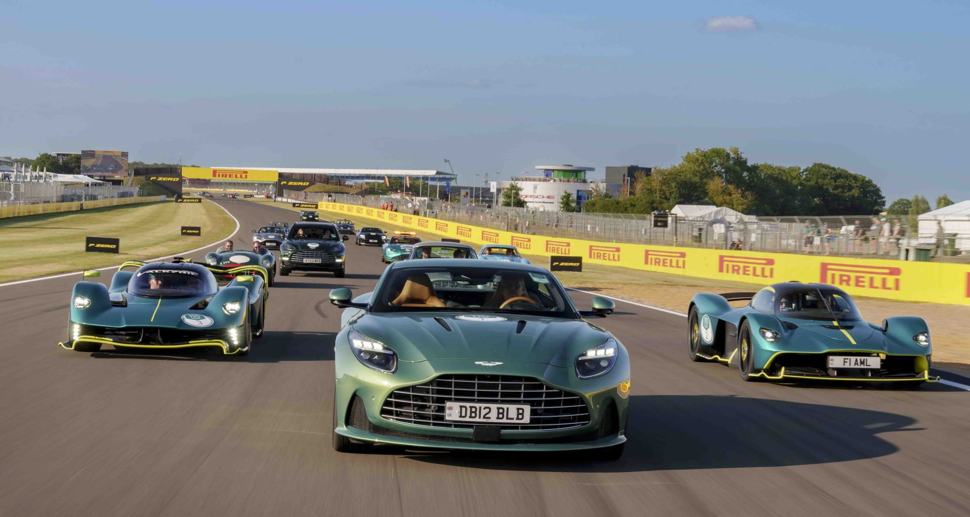 110 Aston Martin cars take to the British Grand Prix in celebration of the brand’s 110th anniversary - Alvinology