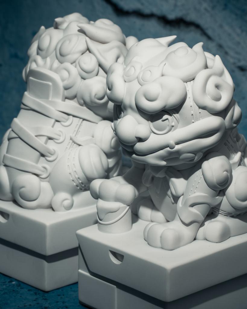 Limited Edition "Triple White" Sneaker Stone Lions Art Toy: A Must-Have Collectible - Alvinology