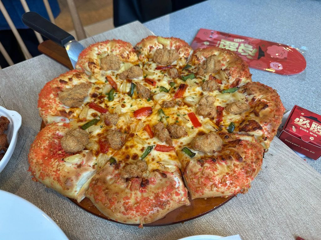 [Promo Alert] Pizza Hut Singapore Launches an Interactive Huat Keychain and Sweet ‘N’ Sour Blossom Pizza for Lunar New Year 2025 - Alvinology