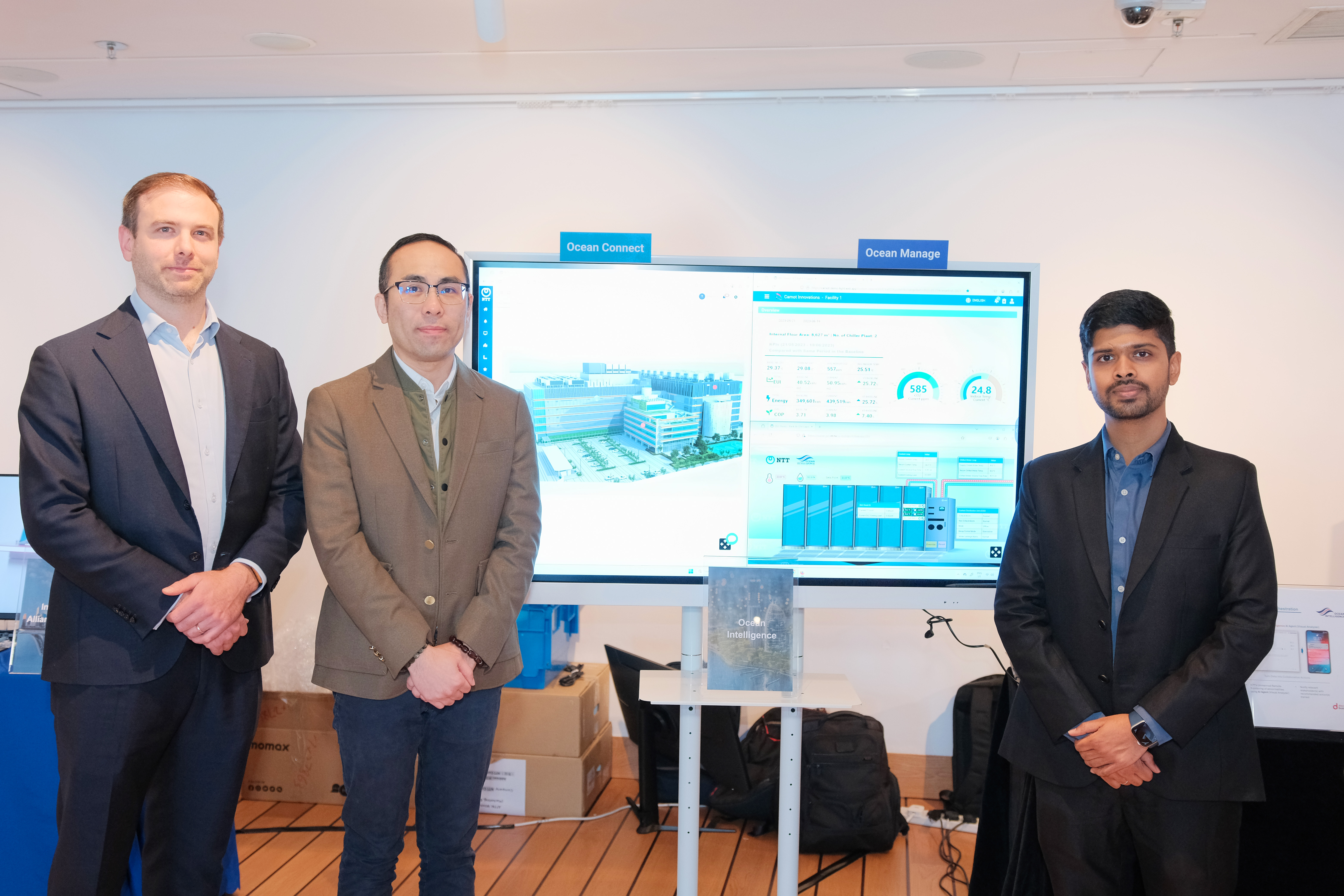 NTT Sparks Smart Building Revolution with New OCEAN Intelligence™ Platform in Hong Kong Phil McManus, Director, Business Innovations, NTT Com Asia (left), Jackie Yuen, Senior Director, System Design & Architecture, NTT Com Asia (middle), and Ashish Jerry Justin, Co-founder and CEO, Carnot Innovations (right) showcase the NTT OCEAN Intelligence™ and the Chiller Plant Energy Optimization, powered by Carnot Innovations.