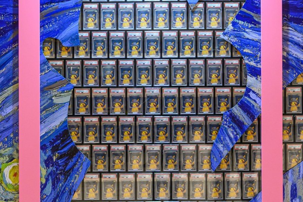 The event's centerpiece was a world-first installation: over 400 PSA 10-graded "Pikachu with Grey Felt Hat" cards, stacked into a mosaic valued at around HK$5 million (US$641,000).