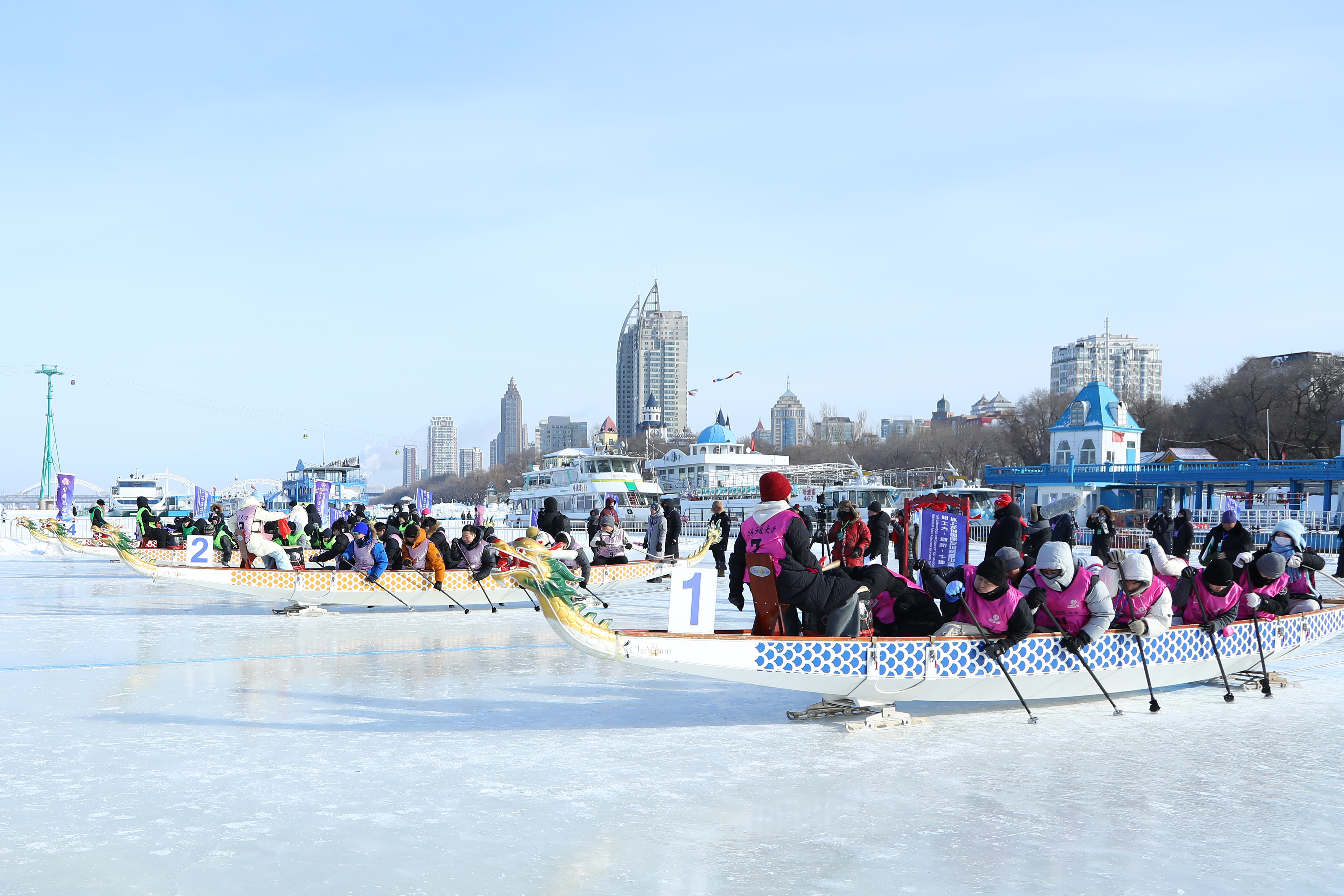 Racing across frozen rivers, uniting youth worldwide: a glimpse into HIT's inaugural ice dragon boat race with Oxford and Cambridge "HIT-Cambridge-Oxford Cup" Ice Dragon Boat International Friendship Race
