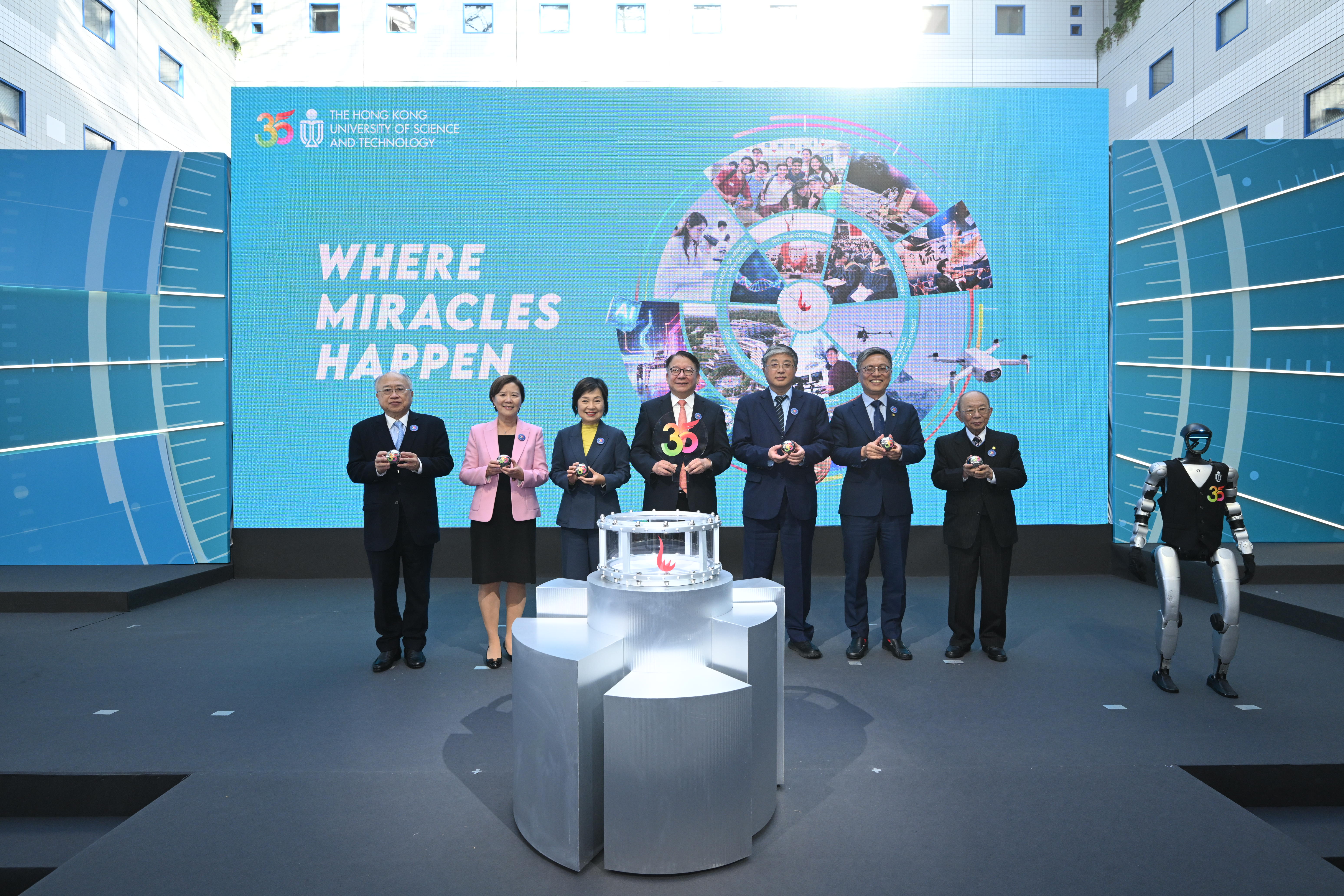 HKUST Launches 35th Anniversary Celebrations Showcasing a Legacy of Miracles and a Vision for the Future The Chief Secretary for Administration of the HKSAR Government Mr. CHAN Kwok-ki (middle), Deputy Director of LOCPG Mr. LUO Yonggang (third right), Secretary for Education of the HKSAR Government Dr. Christine CHOI Yuk-lin (third left) and members of the HKUST leadership team, including Pro-Chancellor Dr. John CHAN Cho-Chak (first right), Council Chairman Prof. Harry SHUM (second right), Court Chairman Dr. the Honorable Andrew LIAO Cheung-Sing (first left), and President Prof. Nancy IP (second left) inaugurate a series of commemorative initiatives for the HKUST 35th anniversary.