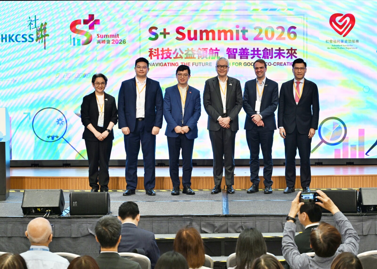 HKCSS "S+ Summit 2026" Navigating the Future – Tech for Good & Co-creation The Hon Grace CHAN Man-yee, Chief Executive of HKCSS, Mr Angus ZHU, Architect, Technology Architecture Department, Tencent Sustainable Social Value Organization (SSV), Mr HO Kai Ming, JP, Under Secretary for Labour and Welfare of HKSAR, The Revd Canon Hon Peter Douglas KOON Ho-ming, SBS, JP, Chairman of HKCSS, Mr David Spriggs, Chief Executive Officer, Infoxchange, The Hon Duncan CHIU, Legislative Council Member (Technology and Innovation) of HKSAR.