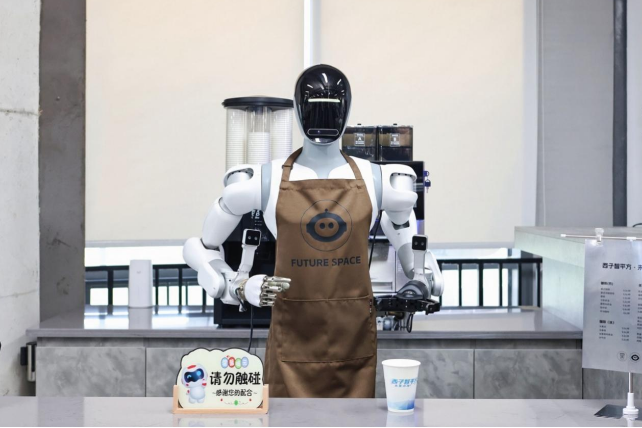 Blending Heritage and Innovation, China's Shangcheng District Hums with Dynamic Vitality The robot barista at Xizi AI² Robotics