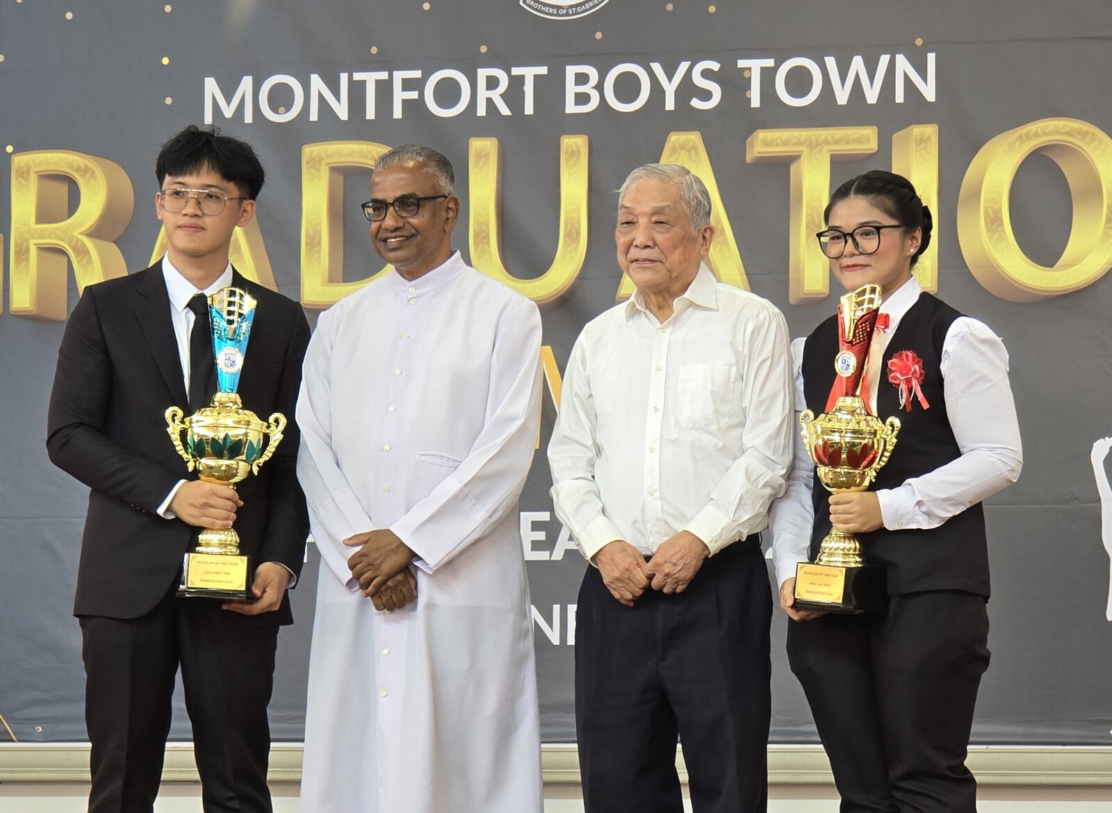 Montfort Boys Town Reinforces Malaysia’s TVET Talent Pipeline With 107 Skilled Graduates Scholars of the year proving that MBT continues to contribute to the development of Malaysia's skilled talent pipeline through practical, industry-focused vocational training. (From left): Looi Wen Ting, Brother Director Robin Devasagayam, Chairman of the Board of Governors Ir. Dr. Philip Tan Chee Lin, and Wan Kai Qing